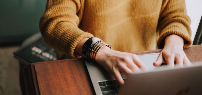 person using laptop computer